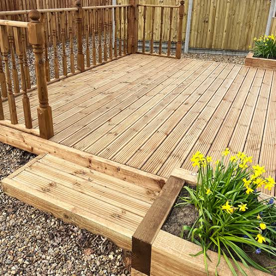 Traditional timber decking with steps and balustrade